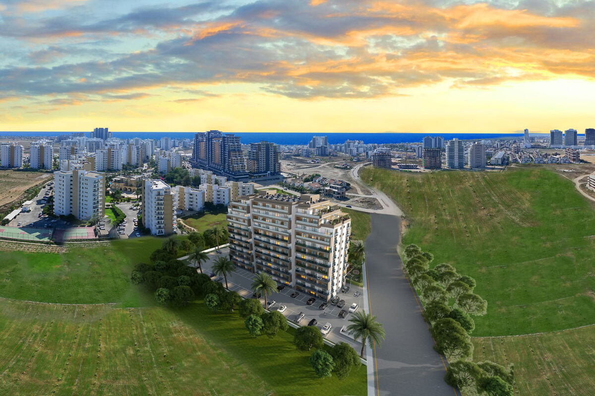 Sea Breeze — Gün batımında havadan bina, kıvrılan yol ve ufukta şehir silueti görselleştirmesi