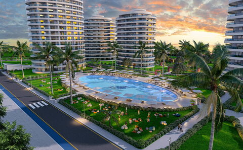 Ocean Life Residence — Havadan oval havuz, çevresinde çimen ve palmiyeler, yanında yol (görselleştirme)